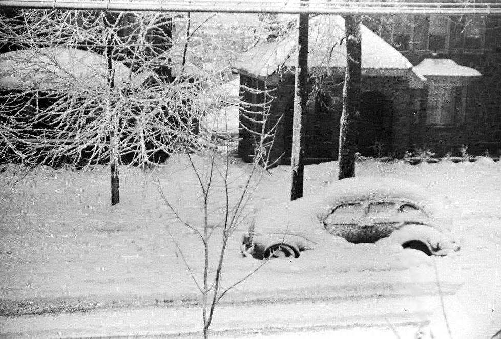 A snow covered vehicle on Bellaire Avenue in 1938.