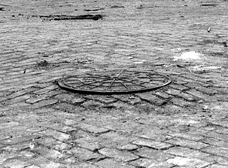 A manhole cover at the intersection of Oakridge
Street and Chelton Avenue in 1919.