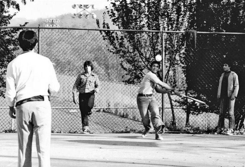 Wiffleball has always been a fun
 pasttime on the courts at Moore Park.
 This picture, from 1969, shows Charlie
 Marratto taking his best cut.