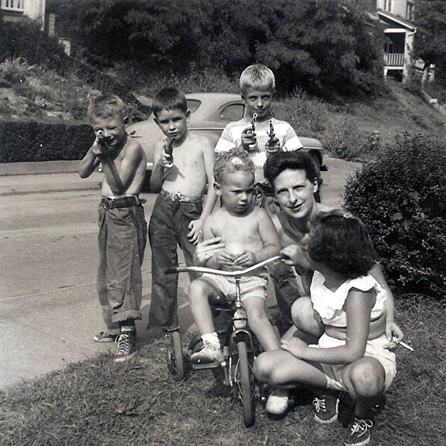Kids gather around Elva McGibbeny - 1953.