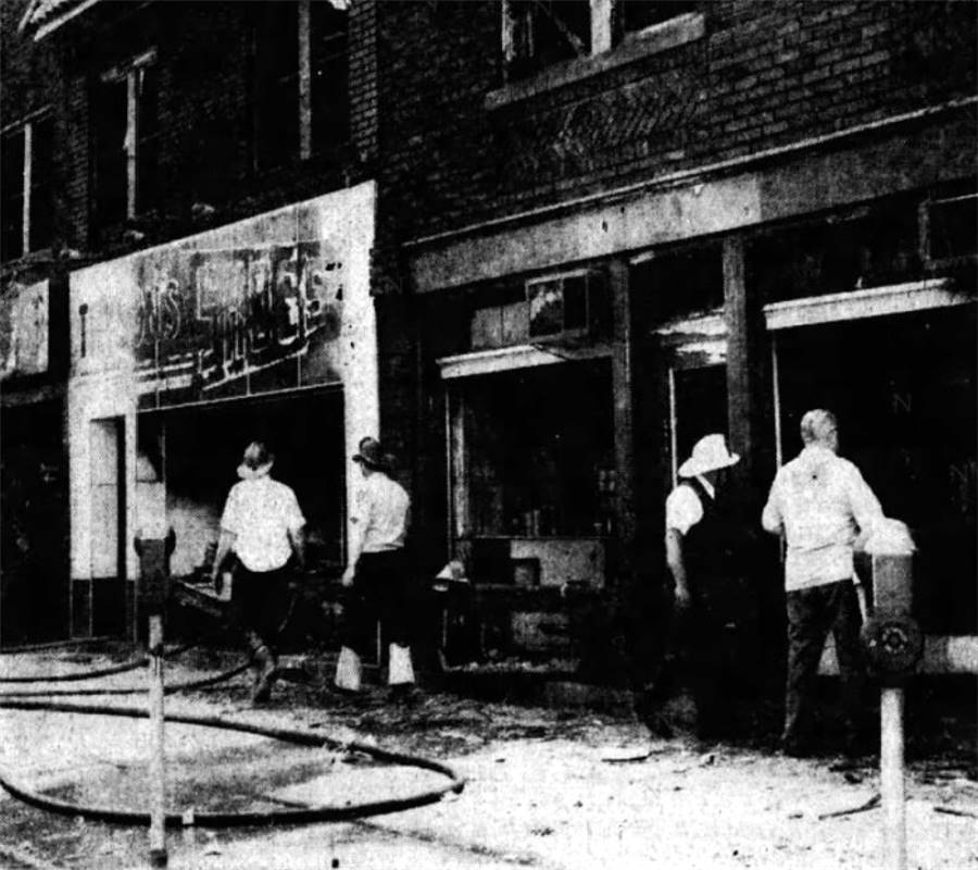 Firefighters examine the aftermath of
the Boulevard Boulevard fire, June 1, 1973