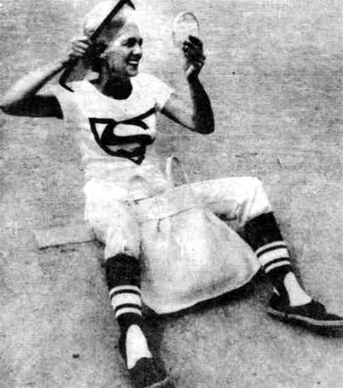 LL Mom Hoots Pfeifer primps on the mound.