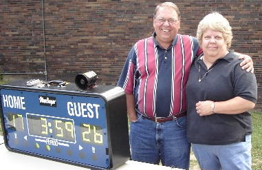 Guests Jan and Bob Beiler, sponsors
 of Conditioned Air, Inc. come to cheer on their team