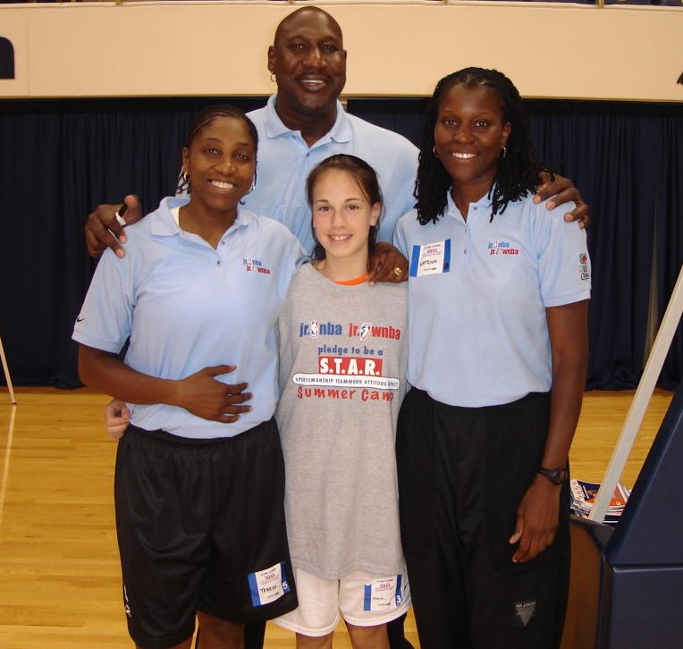 Brookline's 2005-2006 All-Region
JrWNBA selection Maria Rotunda
with WNBA stars and USA Basketball
legends Theresa Edwards and Katrina
McClain. Towering above them all is
NBA legend Darryl Dawkins.